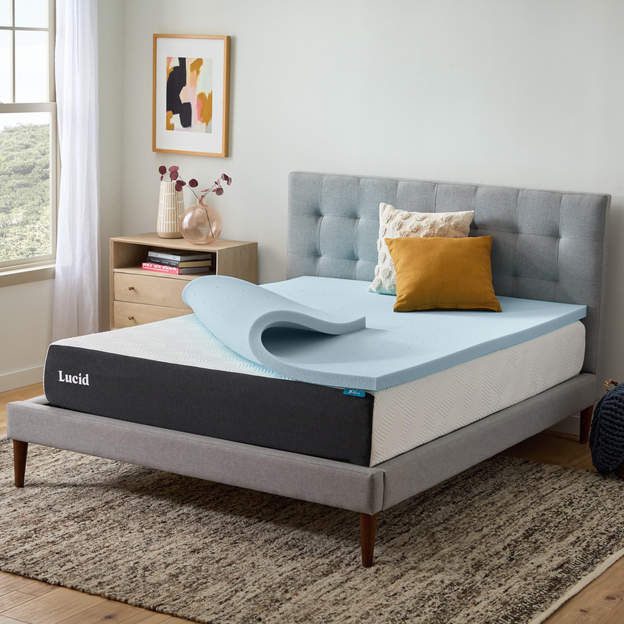 Lucid memory foam topper on bed demonstrates plush, breathable surface.