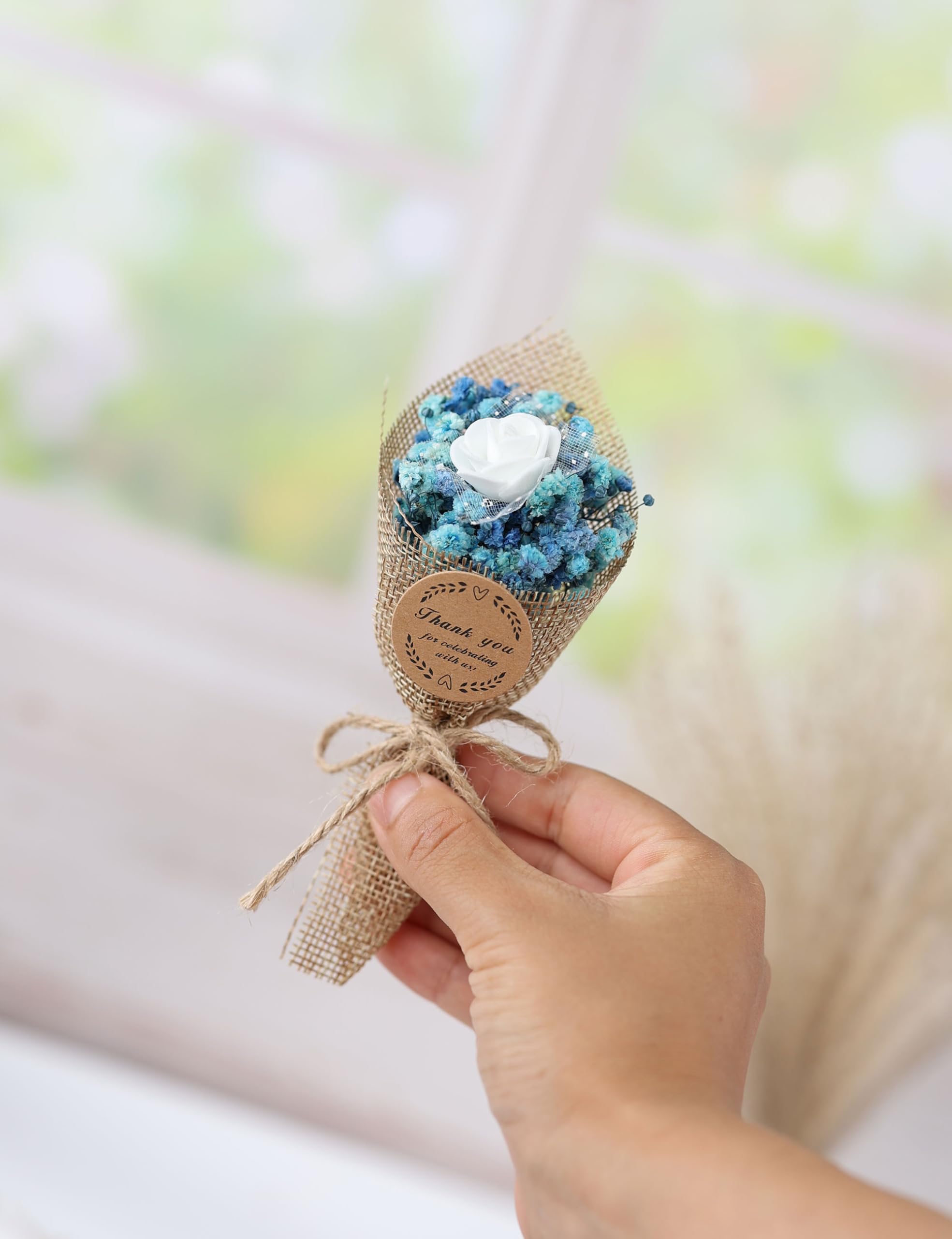 LucidLather compact dried flower magnet bouquet used as wall decor.