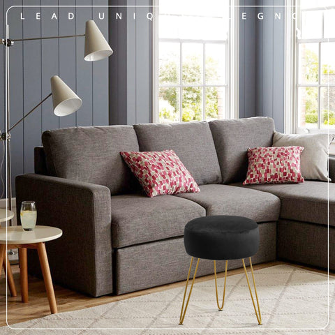 LUE BONA multi-functional stool serves as footrest or seat.