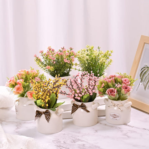 LUEUR artificial blossoms in ceramic pots ideal for living room accents.