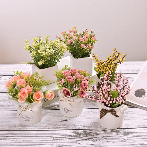 LUEUR decorative artificial blooms in ceramic pots add color to any room.