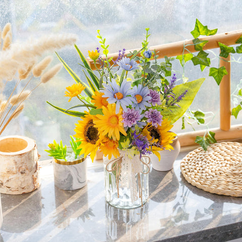 LUEUR sunflower-daisy-eucalyptus arrangement showcases vibrant colors for spring living spaces
