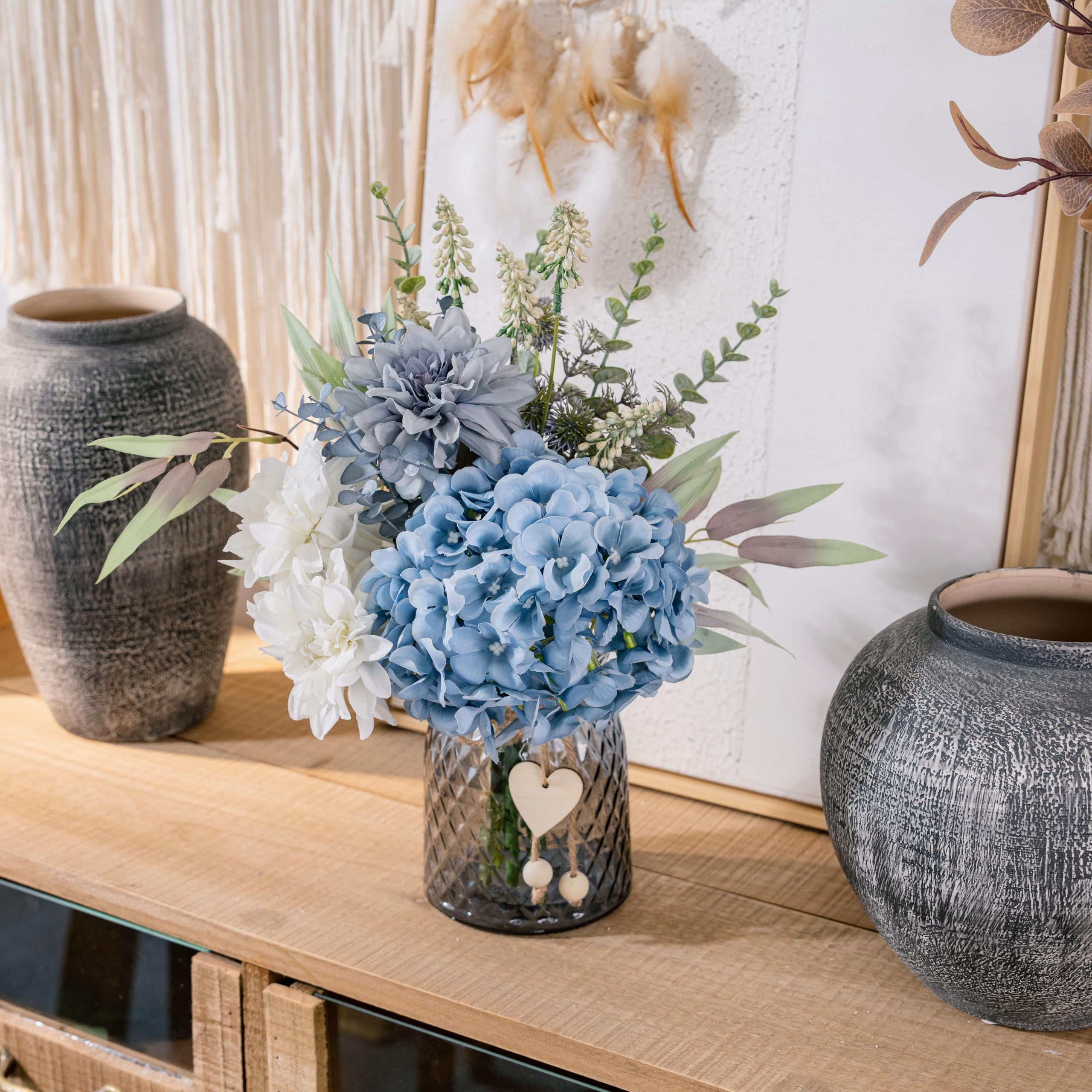 LUEUR twine-decorated glass vase adds classic detail to any space.