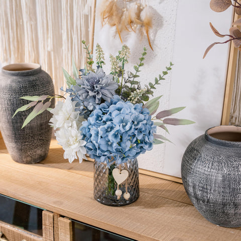 LUEUR twine-decorated glass vase adds classic detail to any space.