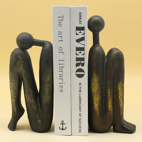 Lukitas Thinker bookend pair side view showing independent postures and style.