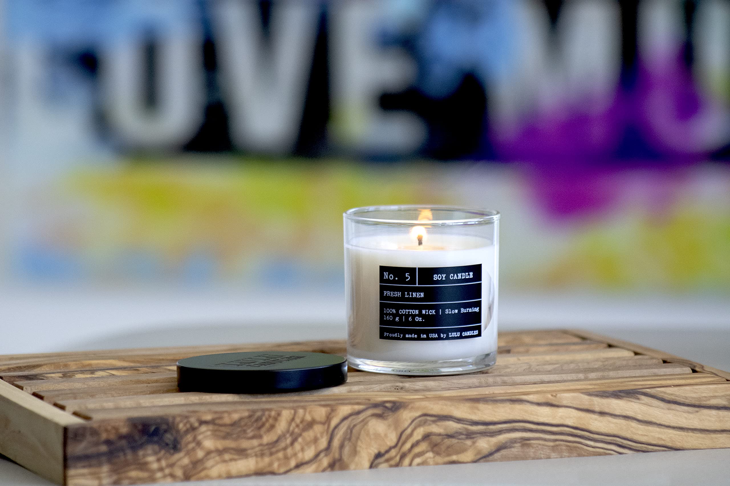 Lulu Candles 6oz jar close-up shows compact premium design