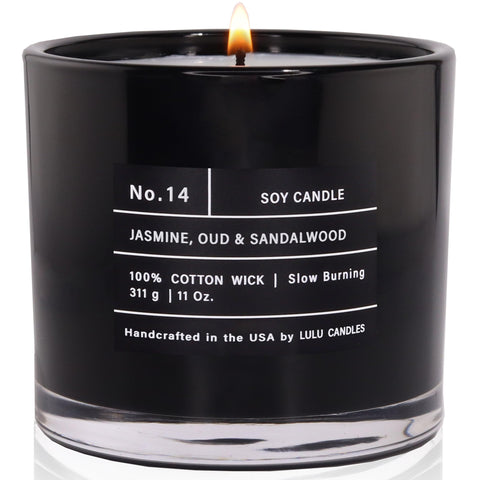 Lulu Candles Jasmine-Oud-Sandalwood jar burning with a rich, inviting aroma.