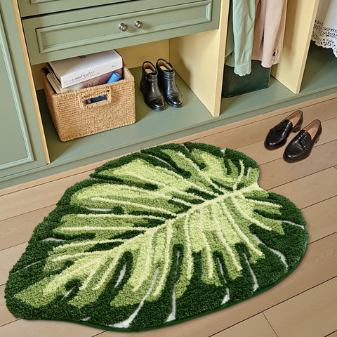 LUMI absorbent rug in green leaf design keeps floors dry.