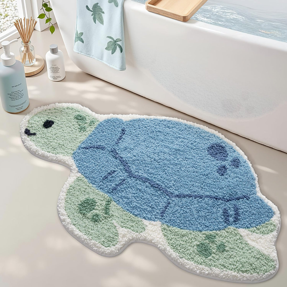 LUMI sea turtle bath mat in blue provides quick-drying comfort after showers.