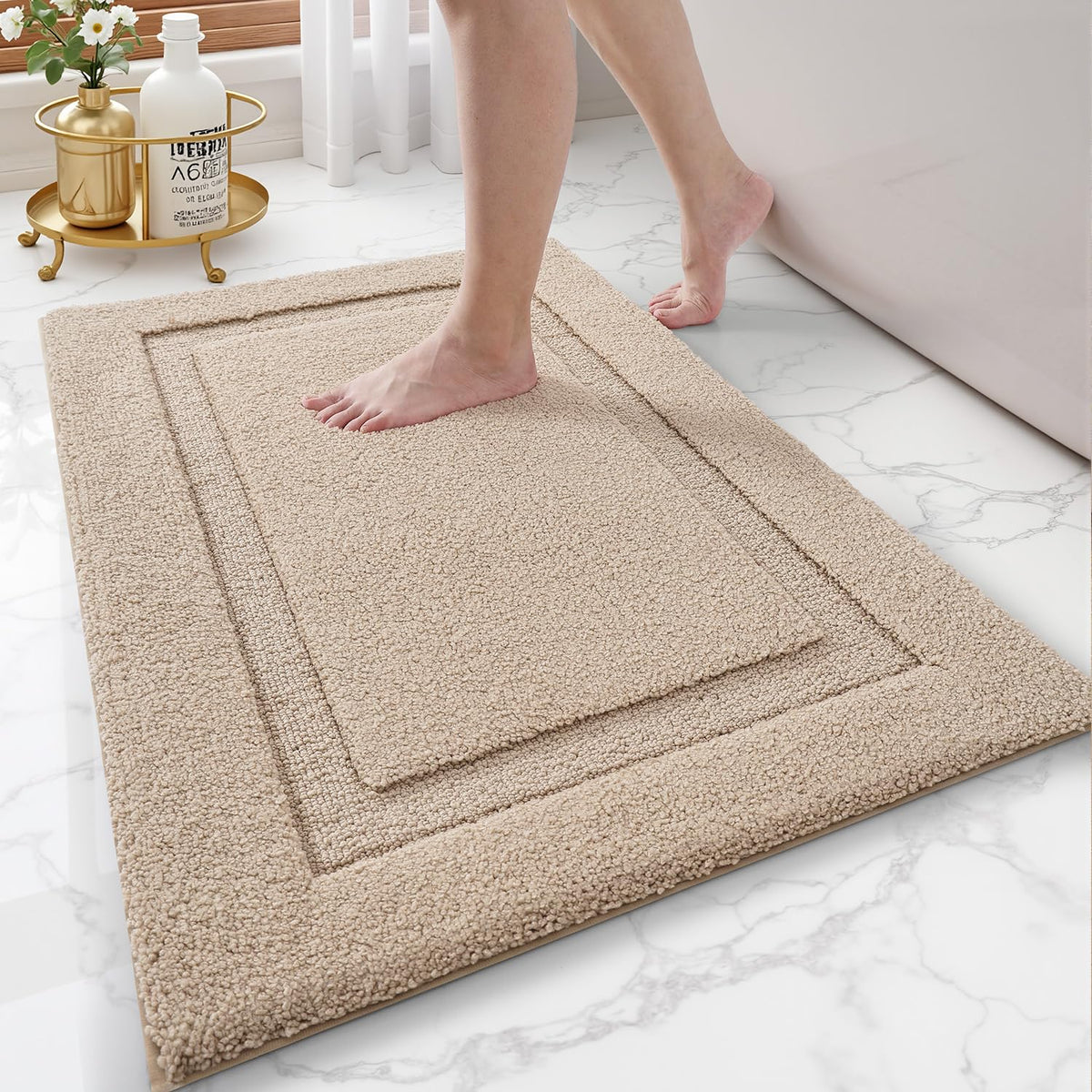 LUMI Ultra-Soft bath rug with non-slip backing provides stable footing on wet floors.