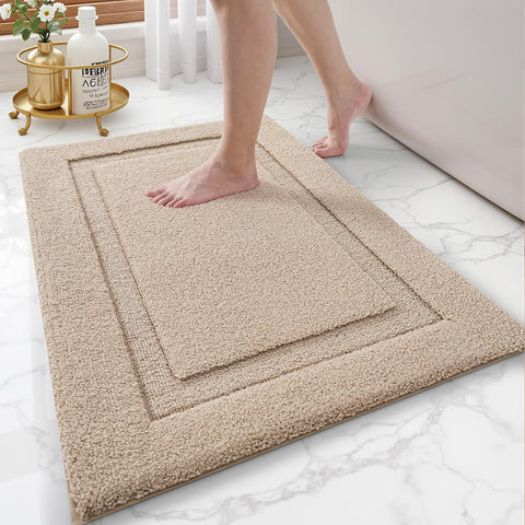 LUMI Ultra-Soft bath rug with non-slip backing provides stable footing on wet floors.