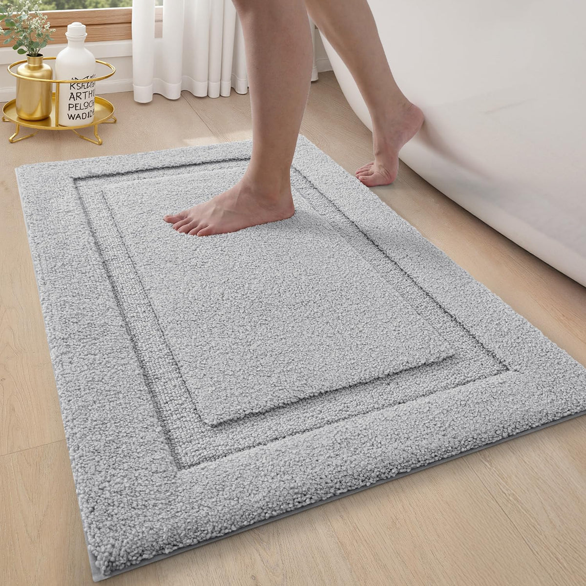 LUMI ultra-soft bath rug with non-slip TPR backing for stable steps in damp bathrooms