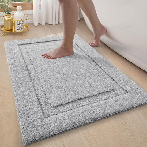 LUMI ultra-soft bath rug with non-slip TPR backing for stable steps in damp bathrooms