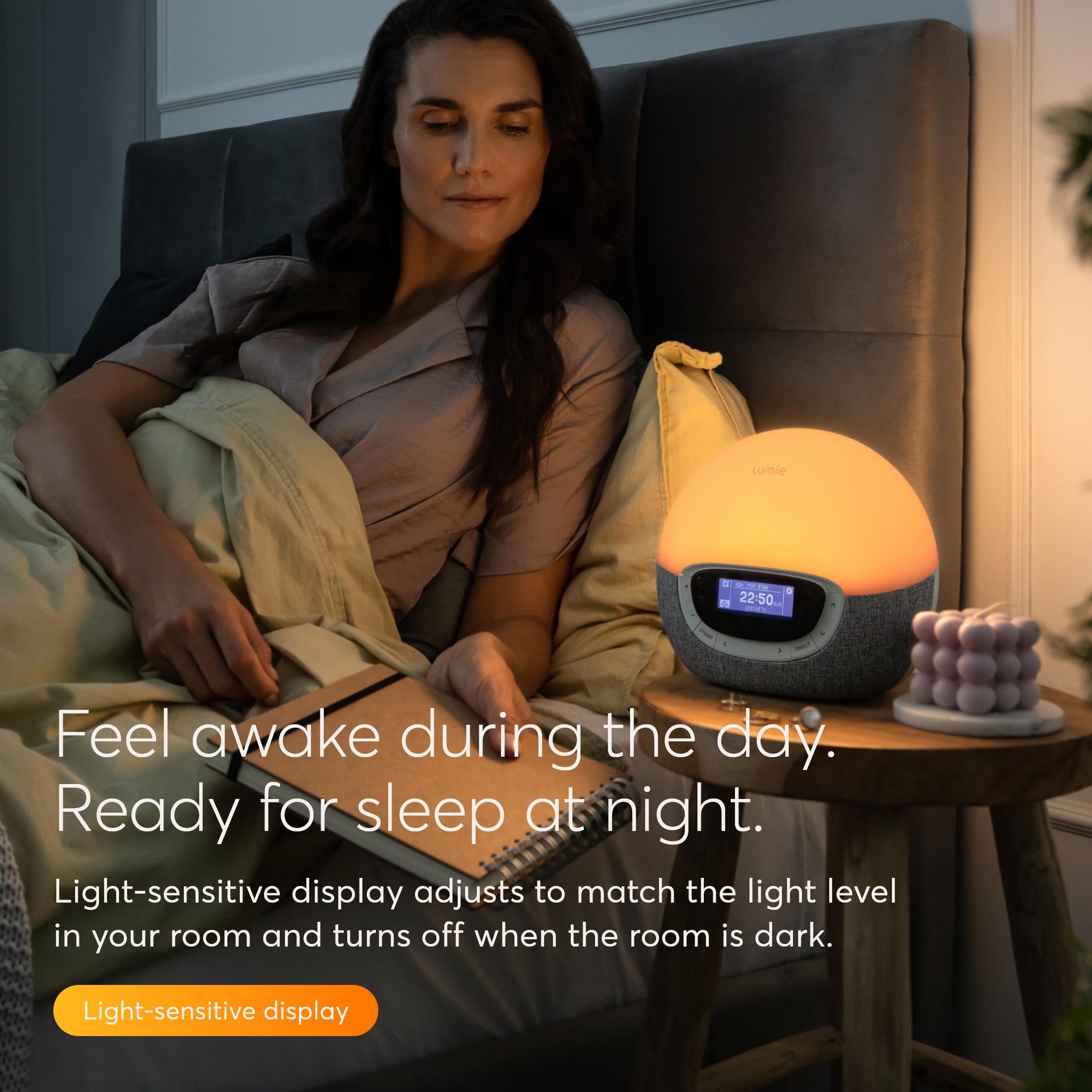 Lumie Bodyclock Shine 300 night light in a dark room for soft nighttime illumination.