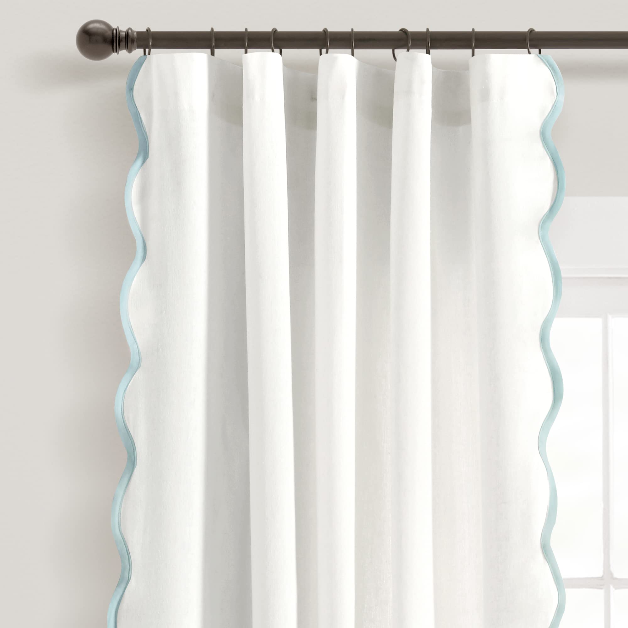 Lush Decor Coastal Chic light-filtering panel reduces glare and preserves privacy.