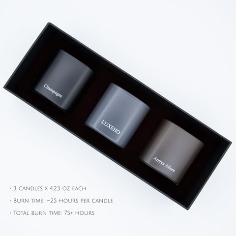LUXEHO amber candle in a black matte jar adds golden refinement