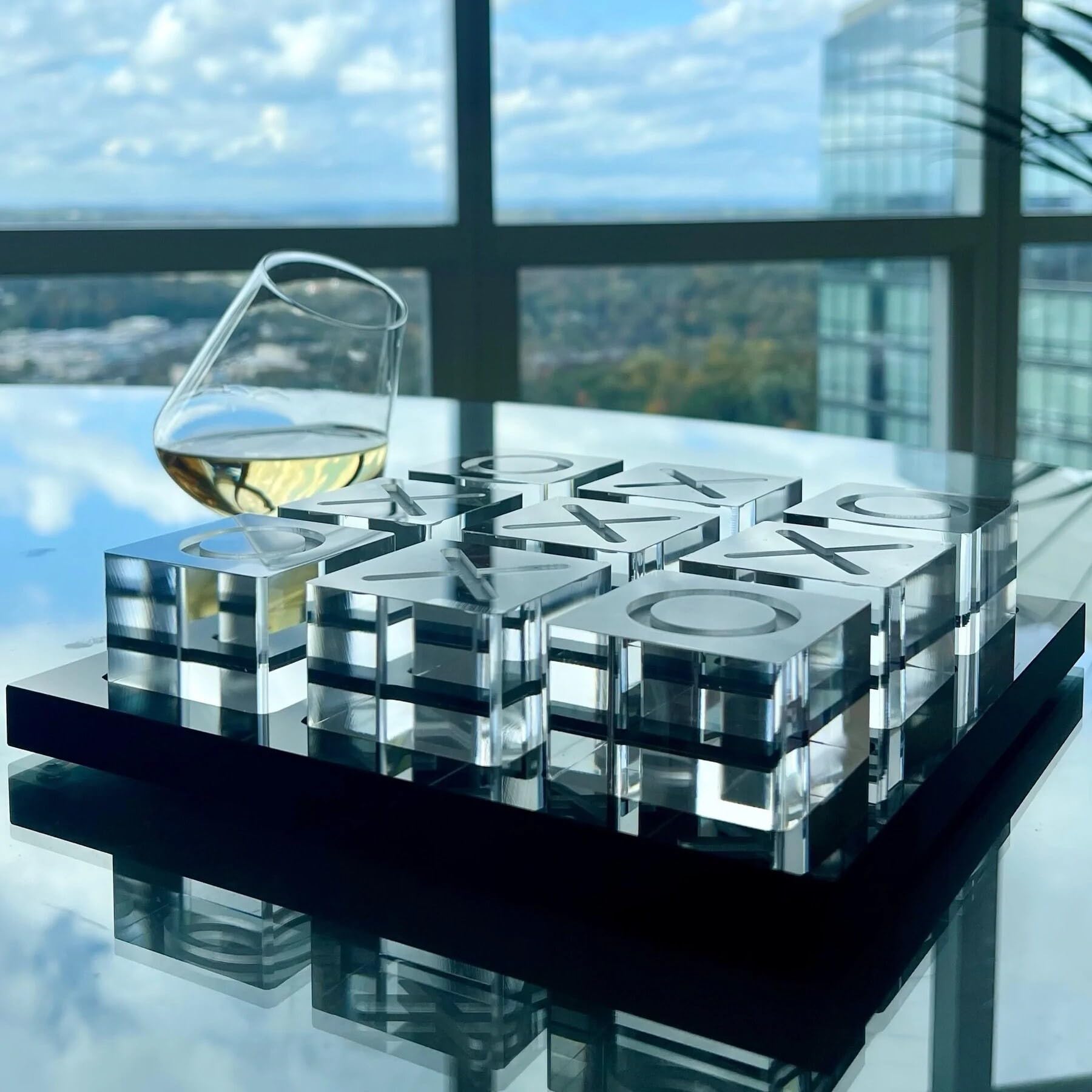 LuxLand Home clear XO pieces offer tactile gameplay with stylish, modern flair.