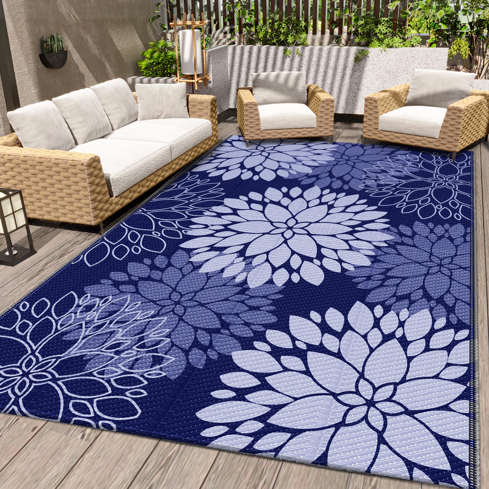 LuxStep blue 4x6 outdoor rug on patio, waterproof and easy to clean.