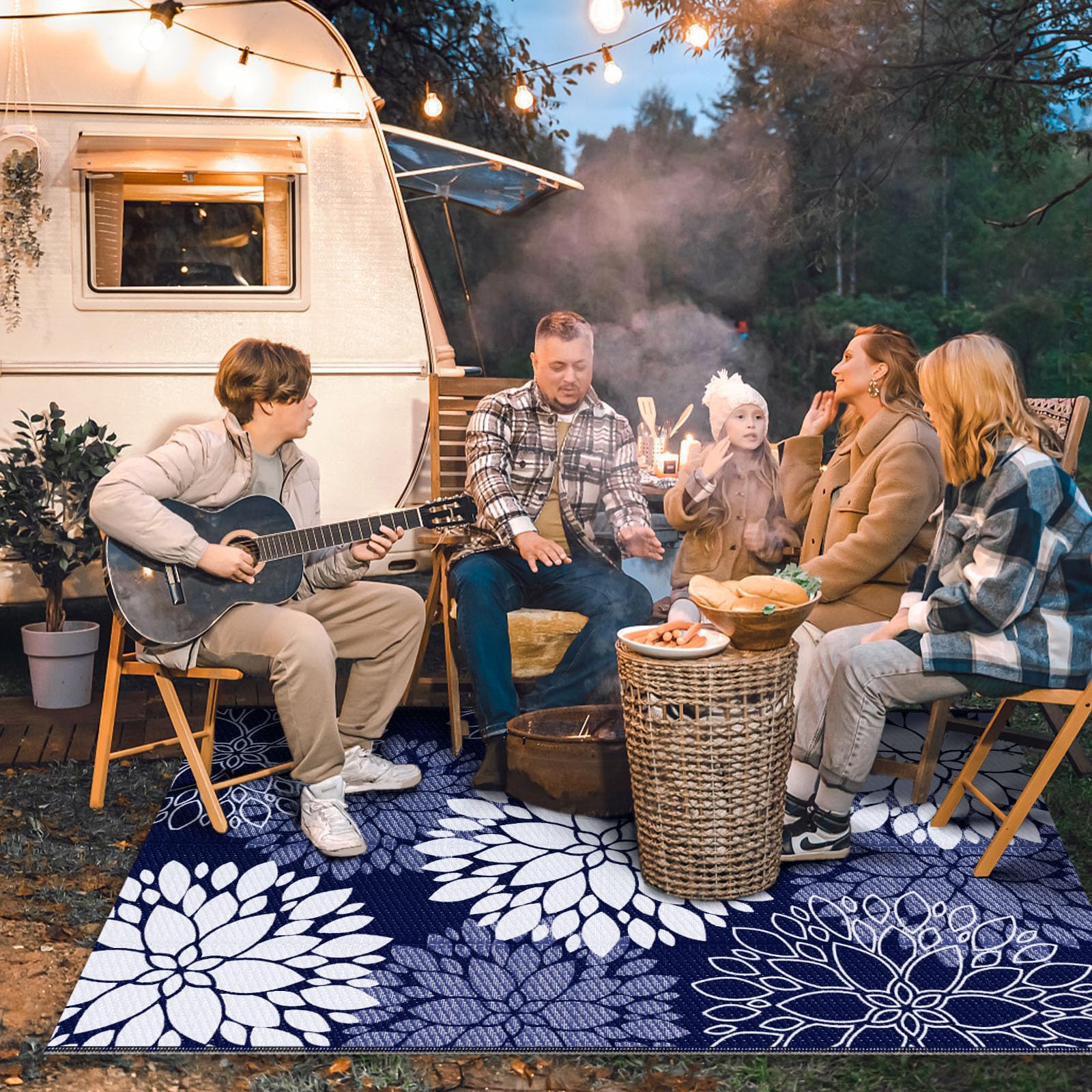 LuxStep blue reversible rug shows floral patterns on both sides.