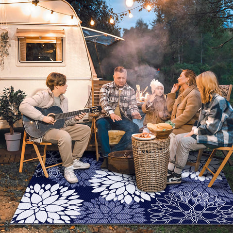 LuxStep blue reversible rug shows floral patterns on both sides.