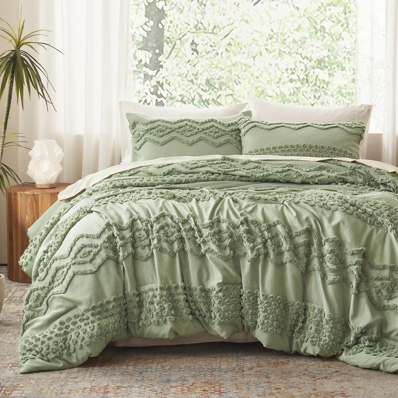 Luxudecor sage green tufted comforter set in king size, adding boho chic style to a bedroom.