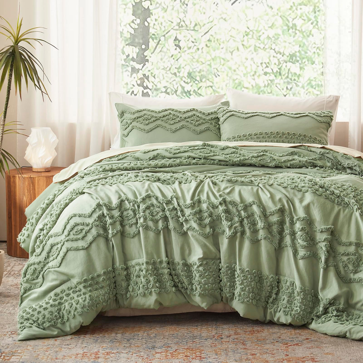 Luxudecor sage green tufted comforter set in king size, adding boho chic style to a bedroom.