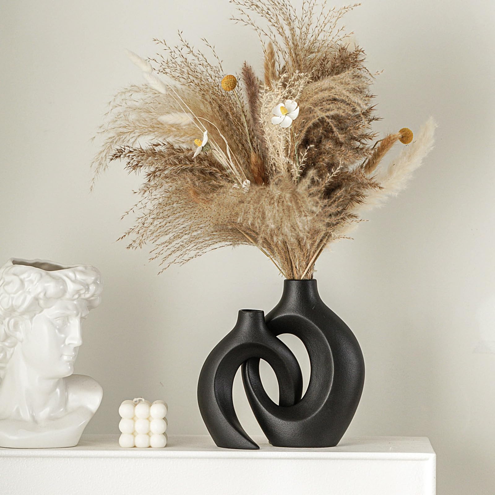 Lvases Snuggle Hollow small vase, side view, frosted texture.