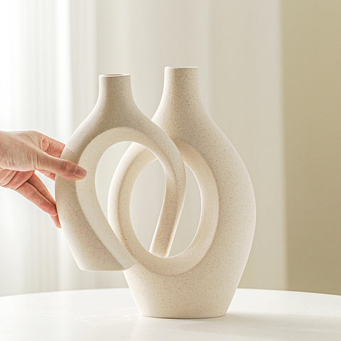 Lvases Snuggle Hollow vase scene on coffee table for a refined centerpiece.