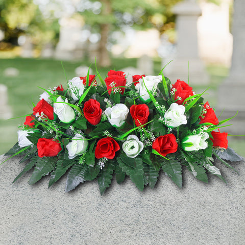 Outdoor gravesite flowers on a headstone by LVXINLI.
