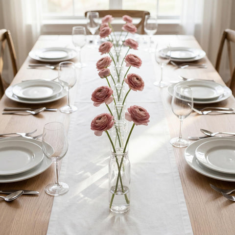 Lyellfe wedding centerpieces with these vases offer soft floral accents.