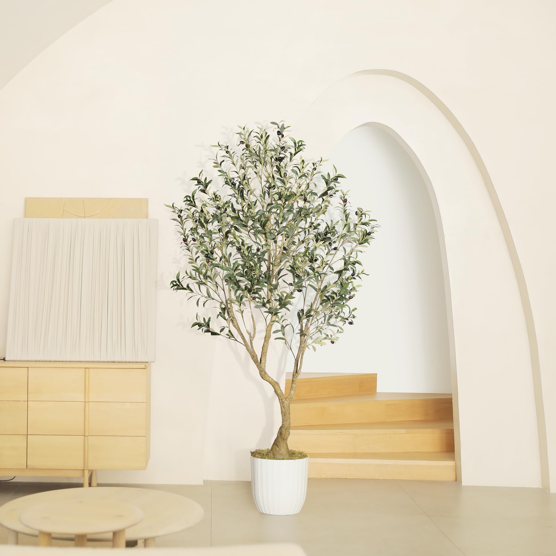 LYERSE Olive Tree branches and leaves capture a lush indoor look.