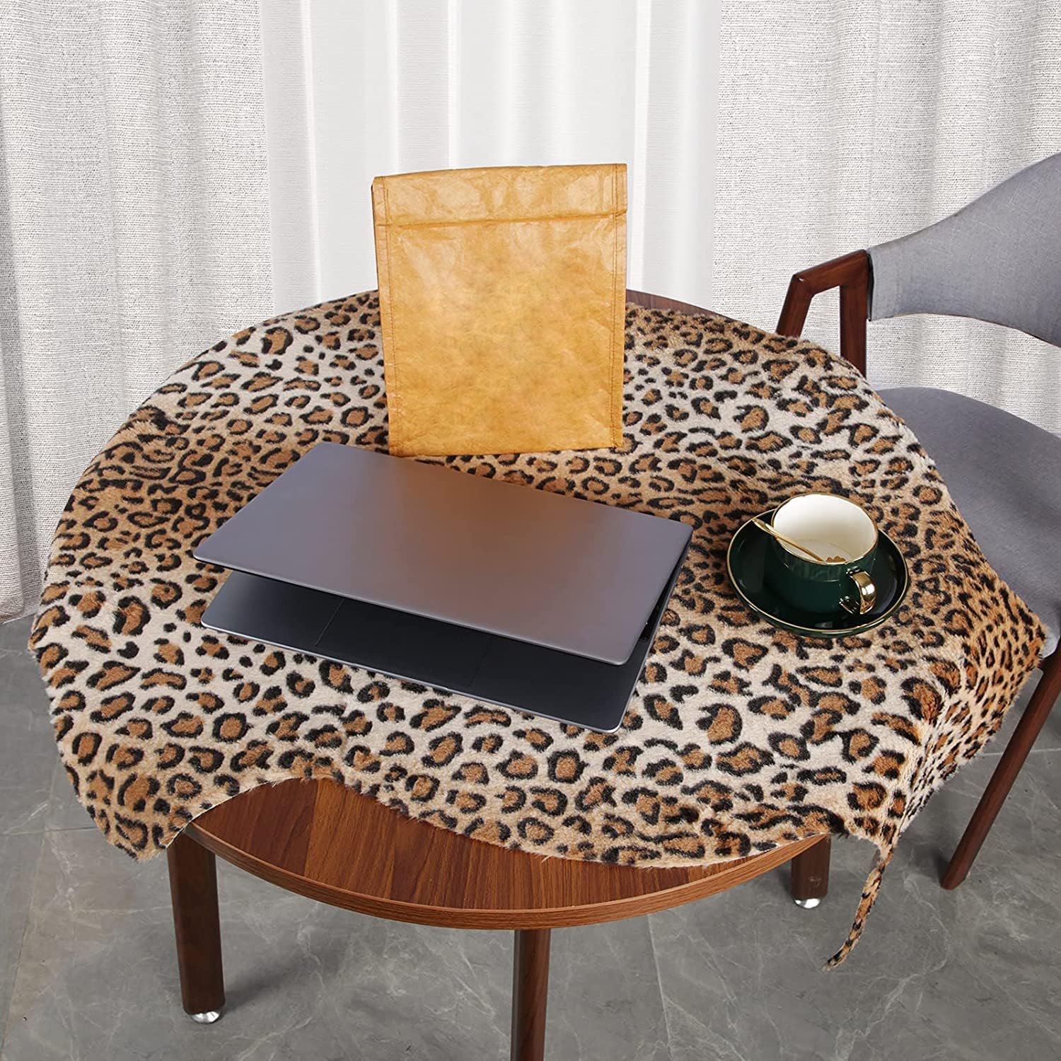 MACEVIA leopard rug at foot of bed offers soft steps