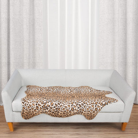 MACEVIA leopard rug under sofa stabilizes seating area