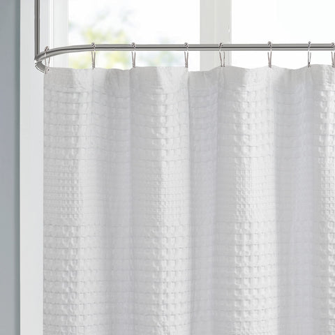 Madison Park Arlo white shower curtain highlights crisp, clean bathroom styling.