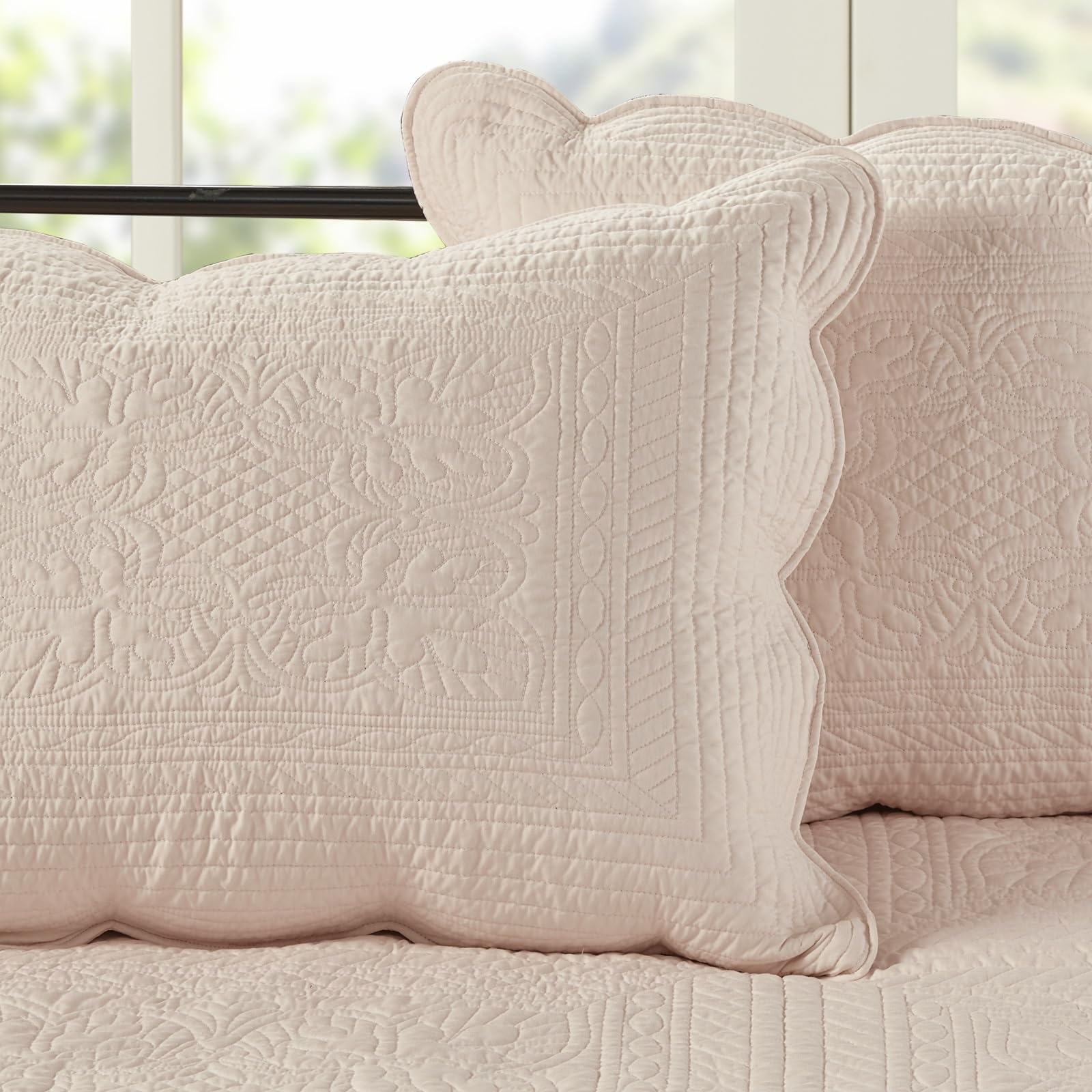 Madison Park decorative pillow embroidery adds luxury accent.