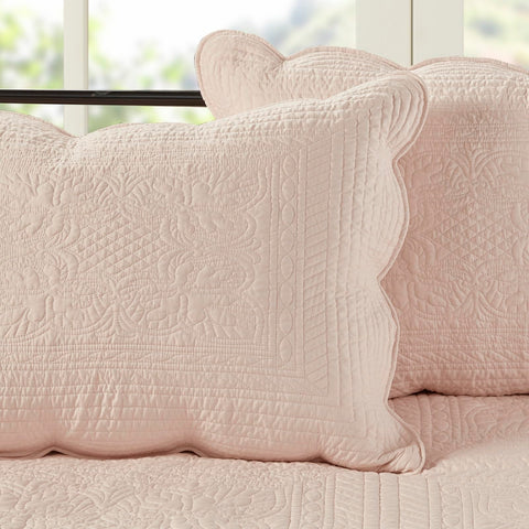 Madison Park decorative pillow embroidery adds luxury accent.