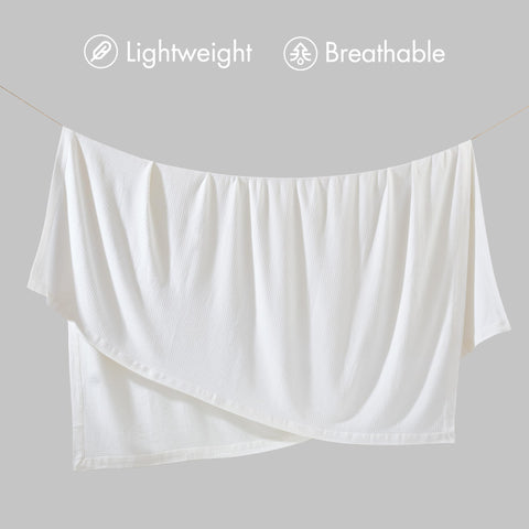 Madison Park Egyptian Cotton Blanket bright white shade for clean, modern decor.