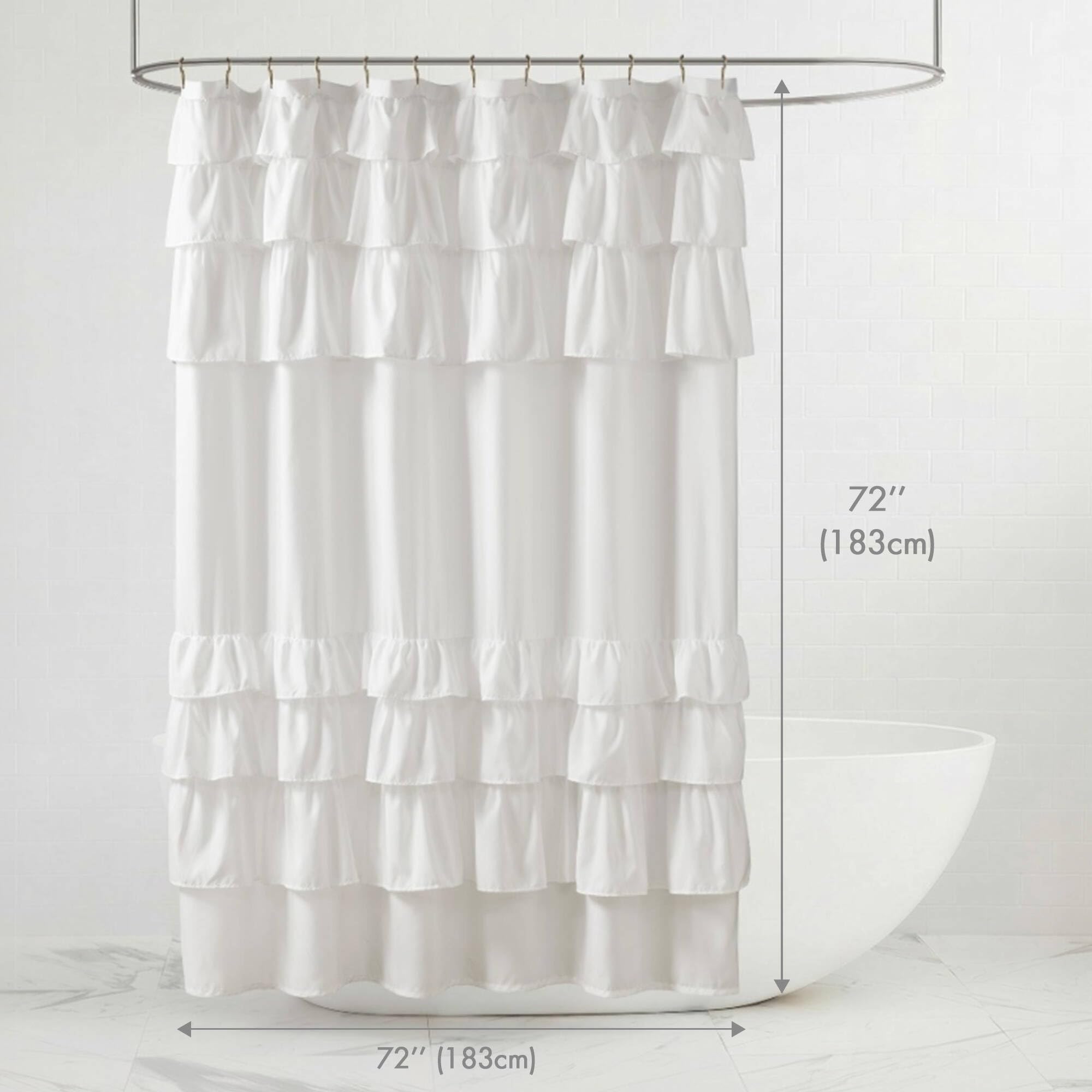 Soft lighting highlights Grace White shower curtain ambience