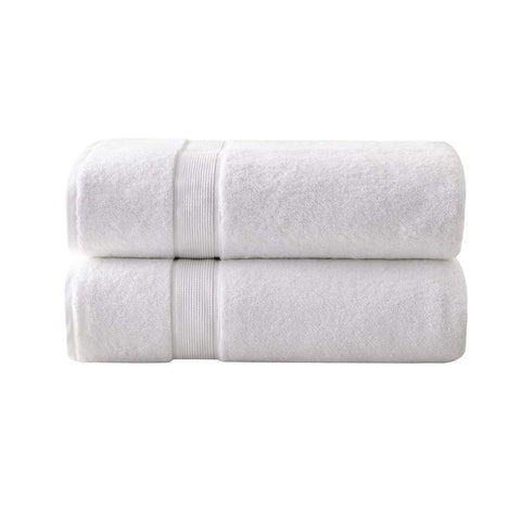 Long-staple cotton towels with double-ply loops deliver plush absorbency and lasting durability