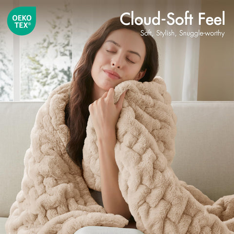 Madison Park Ruched Fur Throw reverse plush side for extra warmth.