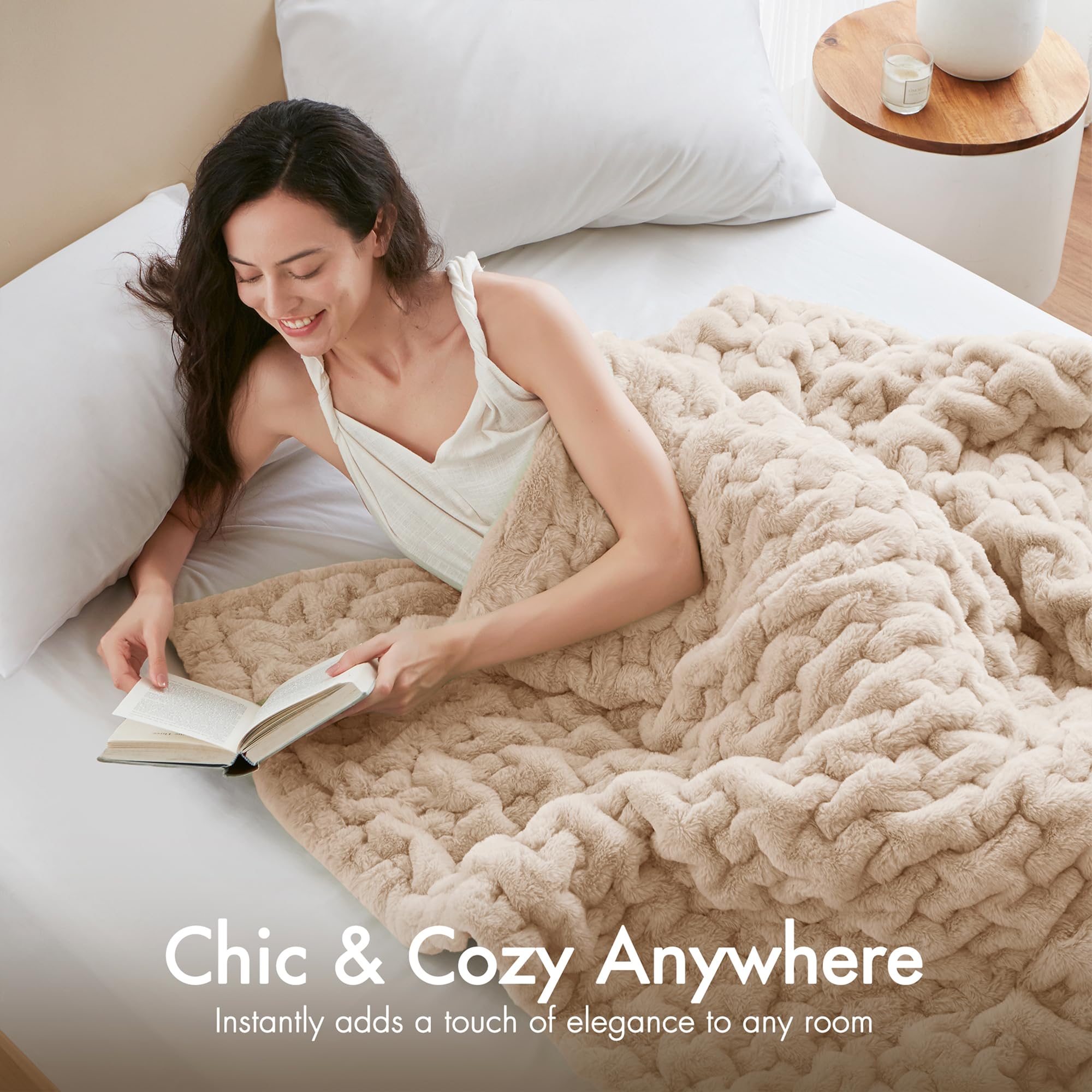 Madison Park Ruched Fur Throw on sofa showing 50x60 inch generous coverage.