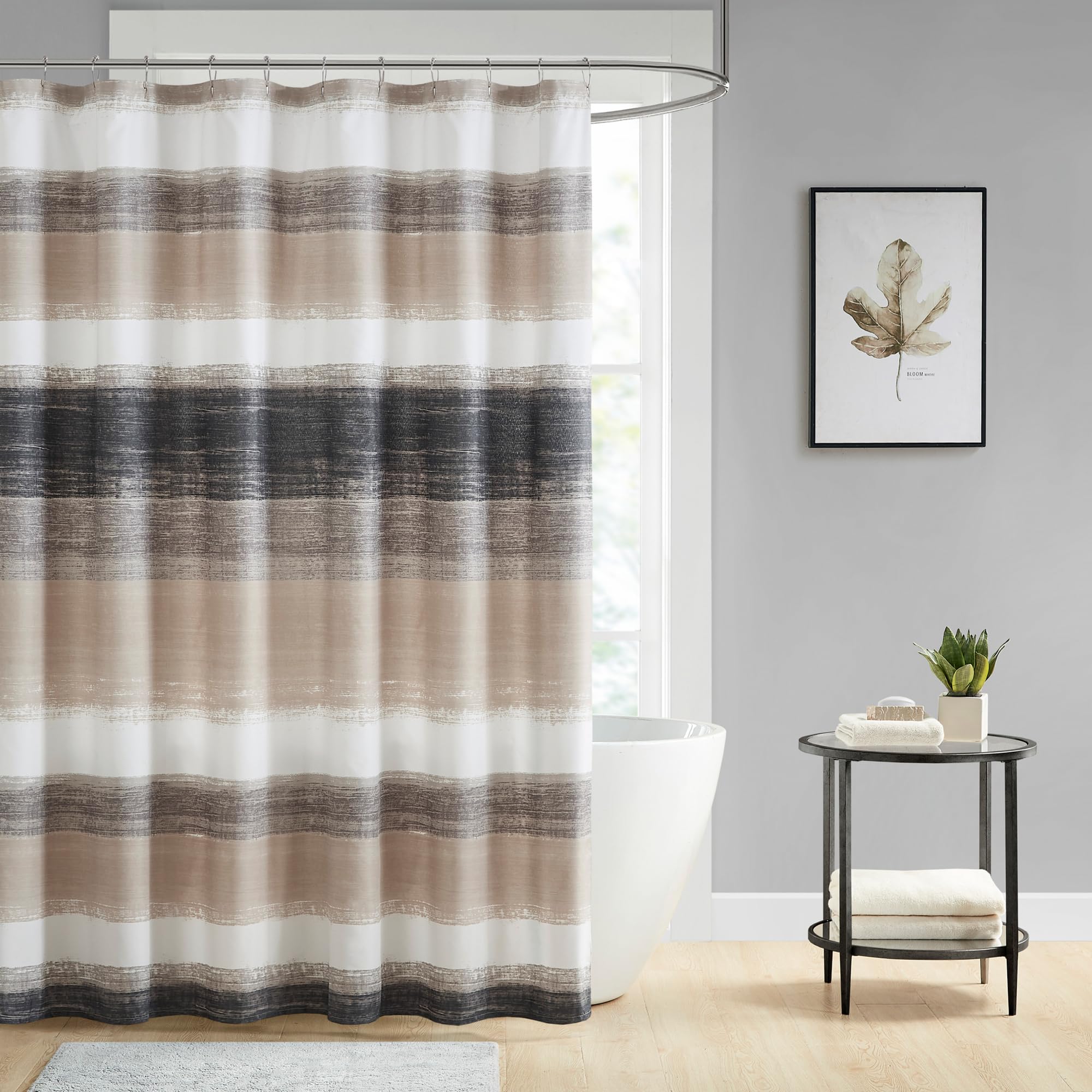 Madison Park Saben shower curtain with watercolor stripe design for modern bathroom decor.