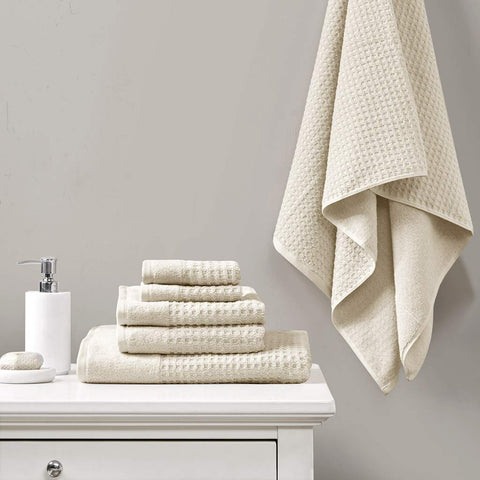 Close-up of waffle weave texture for soft, luxurious touch.