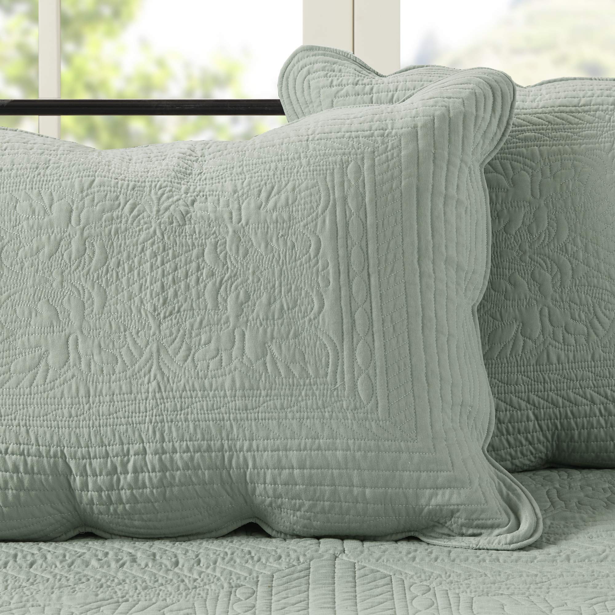 Madison Park Tuscany all-season set shown on a bed for year-round styling.