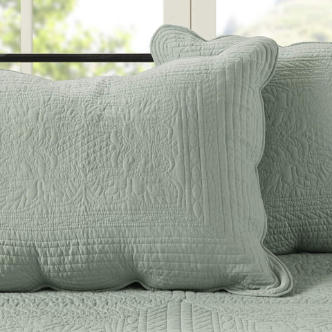 Madison Park Tuscany all-season set shown on a bed for year-round styling.
