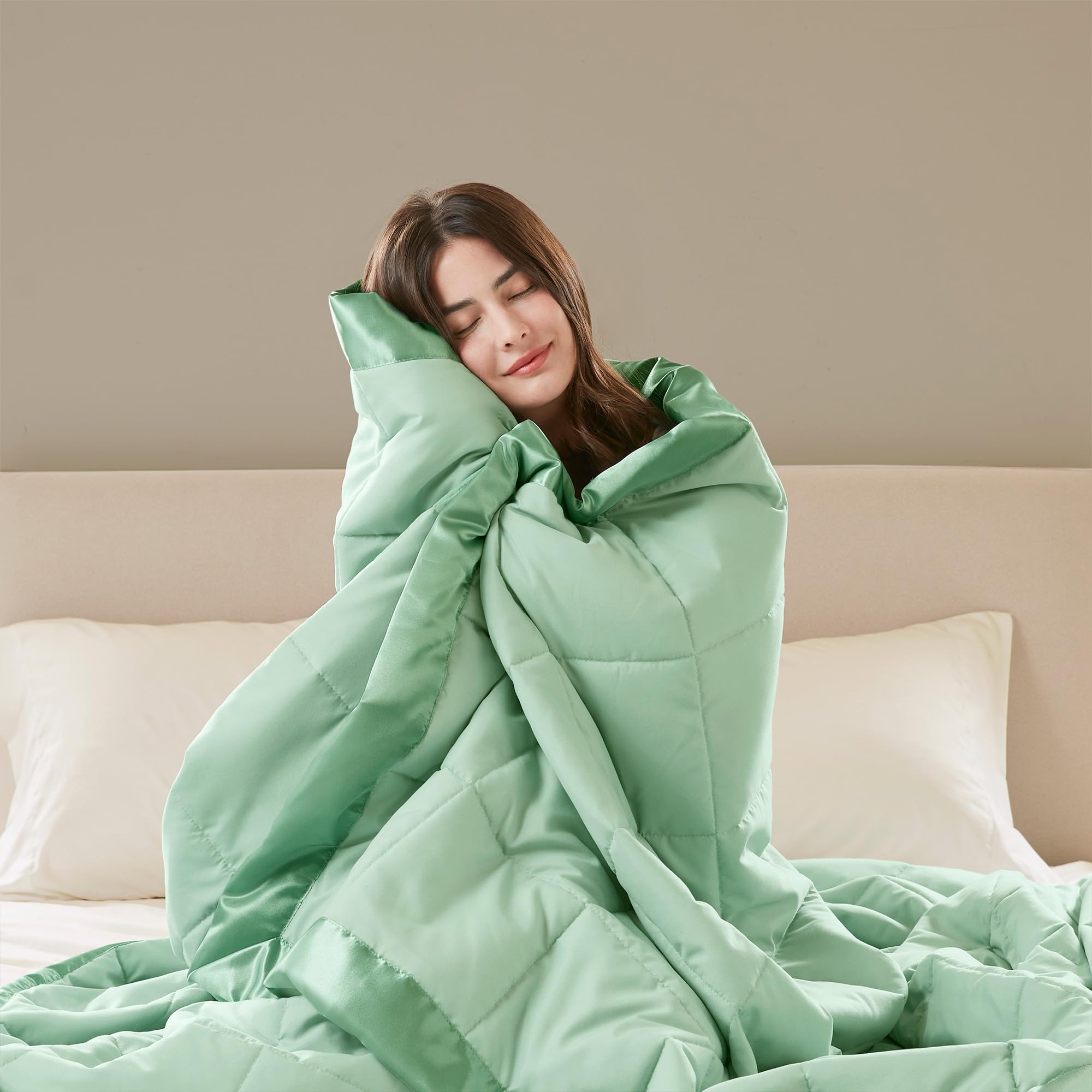 Madison Park Windom all-season layering on bed for warmth.