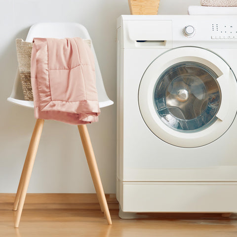 Blush Windom blanket folded for elegant storage