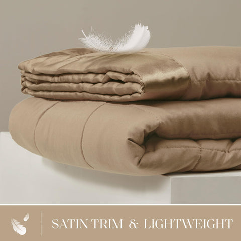 Windom satin trim detail adds a silky premium look for bed or sofa.
