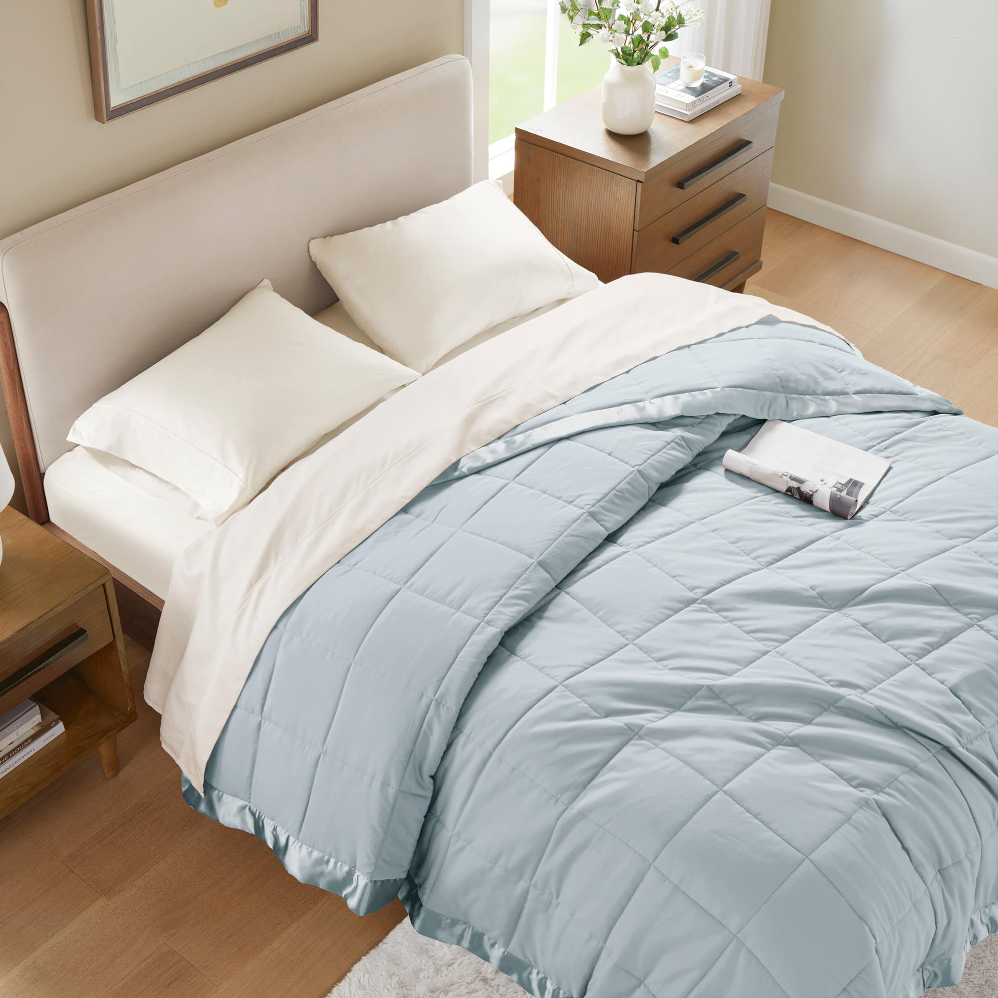 Windom blue king blanket in bed, versatile all-season setup