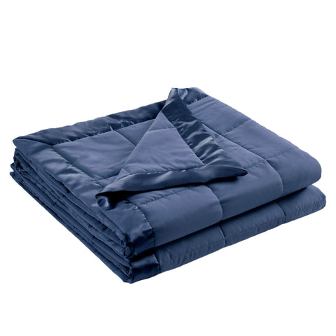Madison Park Windom navy full-queen on bed for all-season comfort